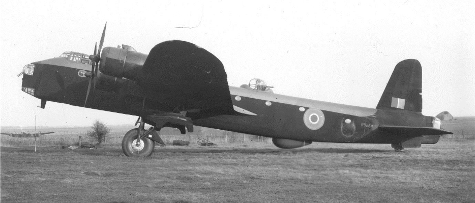 Stirling aircraft side on view in black and white on runway of Defford.